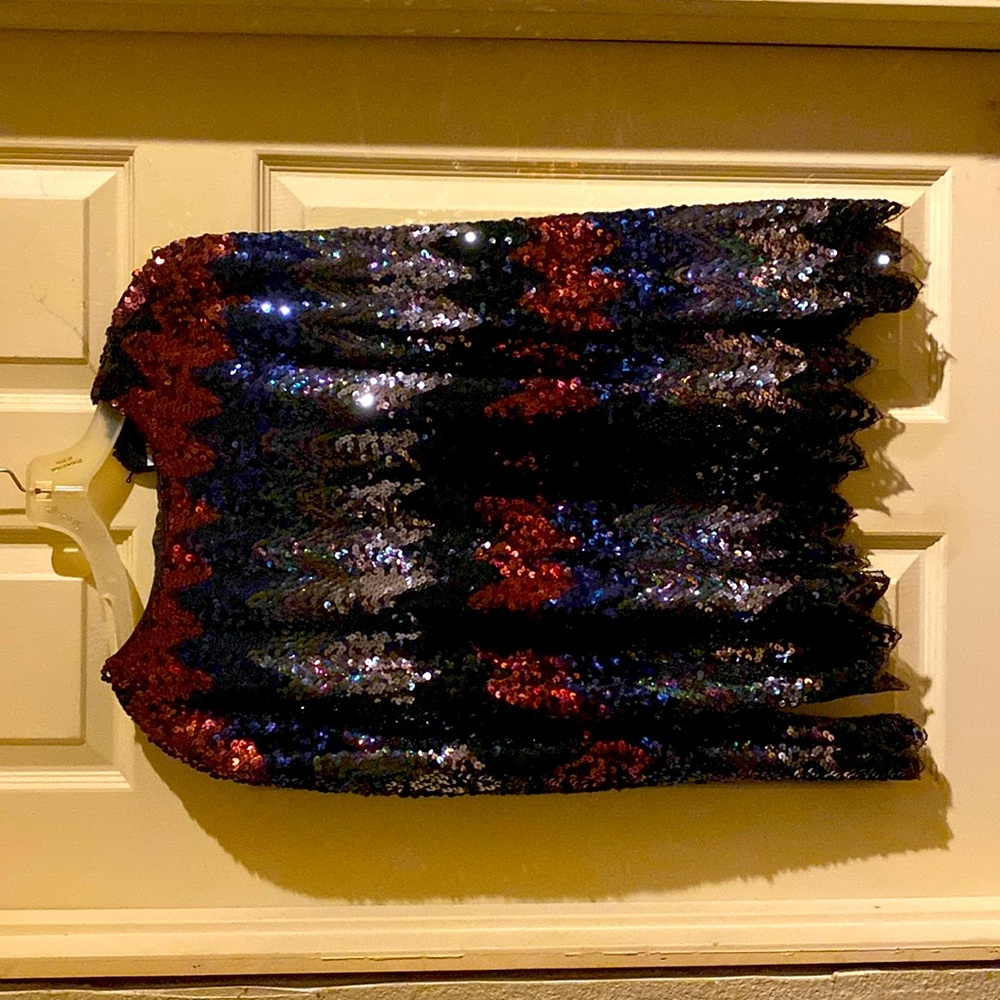 Women’s dress blouse sequin multicolor in a small. Never worn no tags.
